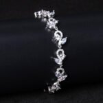 Wholesale Leaf Zircon Bracelet featuring flower and marquise leaf CZ stones on platinum plated copper from JuneJewelry.com