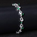 Wholesale Leaf Zircon Bracelet featuring flower and marquise leaf CZ stones on platinum plated copper from JuneJewelry.com
