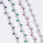 Wholesale Leaf Zircon Bracelet featuring flower and marquise leaf CZ stones on platinum plated copper from JuneJewelry.com