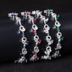 Wholesale Leaf Zircon Bracelet featuring flower and marquise leaf CZ stones on platinum plated copper from JuneJewelry.com