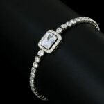 Wholesale Emerald Zircon Bracelet with rectangle halo center stone on platinum plated copper from JuneJewelry.com