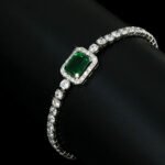 Wholesale Emerald Zircon Bracelet with rectangle halo center stone on platinum plated copper from JuneJewelry.com