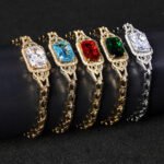 Wholesale Radiant Zircon Bracelet with cushion-cut main stone and filigree halo on platinum plated copper from JuneJewelry.com.