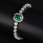 Wholesale Halo Zircon Bracelet featuring octagonal center stone and round halo chain on platinum plated copper from JuneJewelry.com.