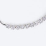 Wholesale Floral Zircon Bracelet with round paved cluster links on platinum plated copper from JuneJewelry.com