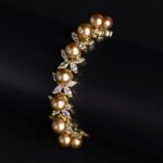 Wholesale Pearl Zircon Bracelet featuring white shell pearls and marquise CZ gems on platinum plated copper from JuneJewelry.com