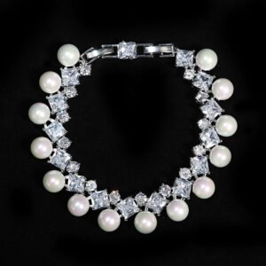 Wholesale Square Pearl Bracelet featuring princess-cut CZ stones and shell pearls on platinum plated copper from JuneJewelry.com