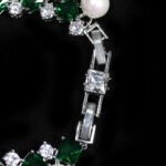 Wholesale Square Pearl Bracelet featuring princess-cut CZ stones and shell pearls on platinum plated copper from JuneJewelry.com