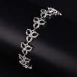 Wholesale Clover Zircon Bracelet with openwork pavé clover links on platinum plated copper from JuneJewelry.com