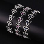 Wholesale Clover Zircon Bracelet with openwork pavé clover links on platinum plated copper from JuneJewelry.com