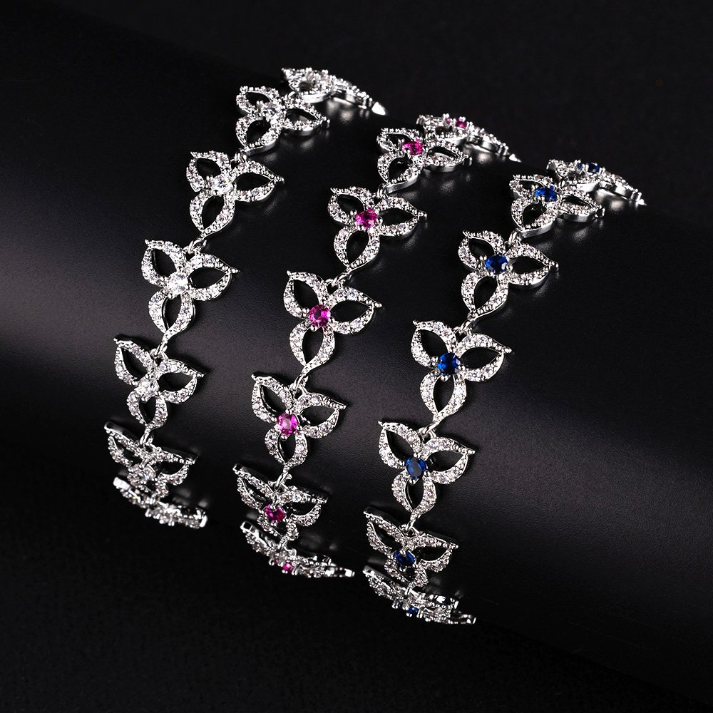 LYSL29815.110.E Wholesale Clover Zircon Bracelet with openwork pavé clover links on platinum plated copper from JuneJewelry.com