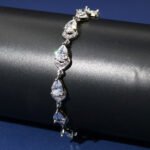 Wholesale Teardrop Zircon Bracelet with pear-cut CZ stones on platinum plated copper from JuneJewelry.com