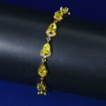 Wholesale Teardrop Zircon Bracelet with pear-cut CZ stones on platinum plated copper from JuneJewelry.com