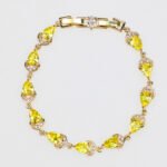 Wholesale Teardrop Zircon Bracelet with pear-cut CZ stones on platinum plated copper from JuneJewelry.com