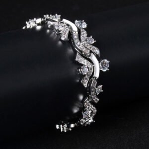 Wholesale Wave Zircon Bracelet featuring paved wave links and solitaire CZ gems on platinum plated copper from JuneJewelry.com