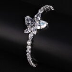 Wholesale Floral Zircon Bracelet with central pear and marquise CZ flower cluster on platinum plated copper from JuneJewelry.com