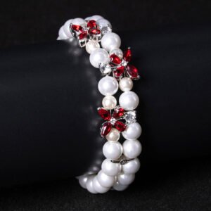 Wholesale Pearl Zircon Bracelet featuring double-strand pearls and CZ flower connectors on platinum plated copper from JuneJewelry.com
