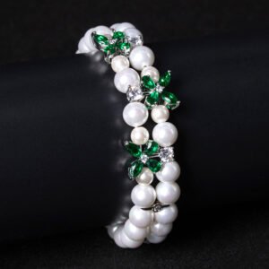 Wholesale Pearl Zircon Bracelet featuring double-strand pearls and CZ flower connectors on platinum plated copper from JuneJewelry.com