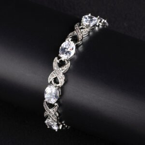 Wholesale Infinity Zircon Bracelet featuring oval CZ gems and paved cross links on platinum plated copper from JuneJewelry.com