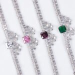 Wholesale Crown Zircon Bracelet with square princess cut centerpiece and CZ flower clusters on platinum plated copper from JuneJewelry.com