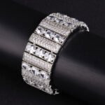 Wholesale Chunky Zircon Bracelet featuring wide paved bar links and oval CZ stones on platinum plated copper from JuneJewelry.com