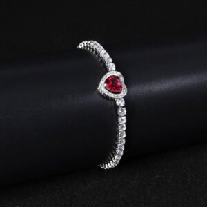 Wholesale Heart Zircon Bracelet featuring a paved heart centerpiece on a tennis chain with platinum plated copper from JuneJewelry.com