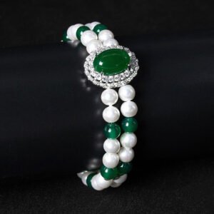 Wholesale Emerald Zircon Bracelet with green oval gem halo centerpiece and double-row pearl strands on platinum plated copper from JuneJewelry.com