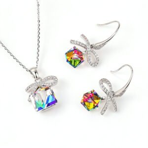 Wholesale ribbon crystal jewelry set featuring platinum plated copper with blue-purple cube Swarovski element crystals from JuneJewelry.com.