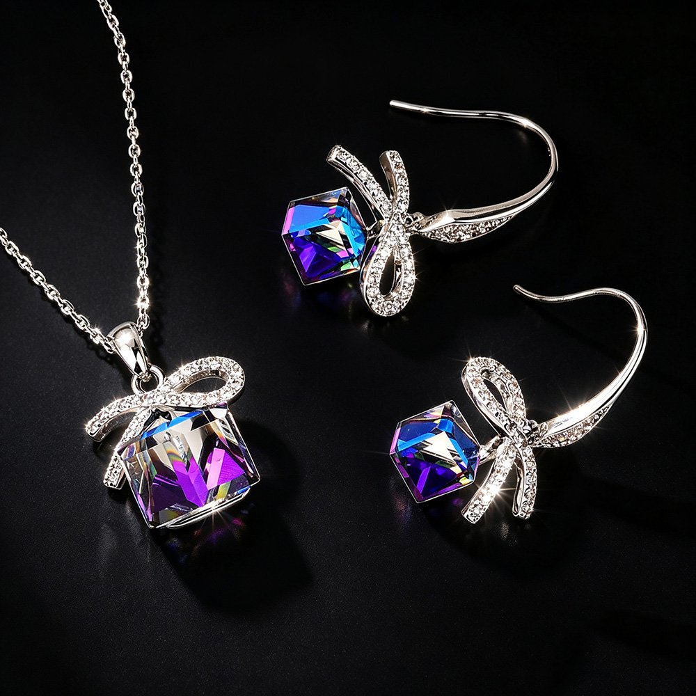1103103A17A.203.A Wholesale ribbon crystal jewelry set featuring platinum plated copper with blue-purple cube Swarovski element crystals from JuneJewelry.com.