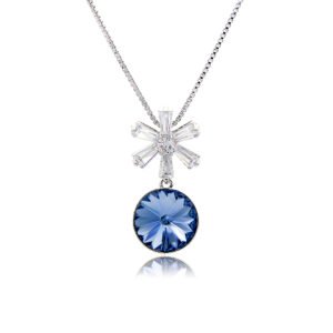 Wholesale crystal snowflake pendant necklace featuring round faceted Swarovski element crystal, cubic zirconia starburst bale, and palladium plated copper chain from JuneJewelry.com.