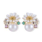 Gold-plated flower stud earrings featuring a white enamel daisy blooming over a smooth faux pearl, accented with a faceted crystal, turquoise bead, and lavender stone.