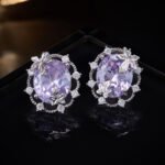 Maple leaf oval cubic zirconia stud earrings with micro-paved scalloped halo border and 925 sterling silver posts