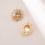 Maple leaf oval cubic zirconia stud earrings with micro-paved scalloped halo border and 925 sterling silver posts