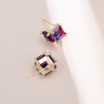 Princess cut geometric CZ stud earrings featuring 3D square cube prong settings and 925 sterling silver posts