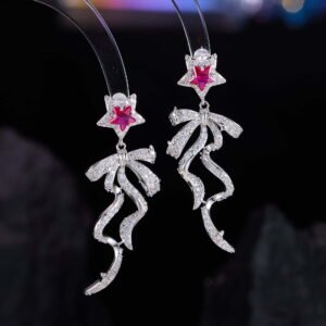 Pink ribbon star CZ drop earrings featuring micro-pave pave bow dangle ribbons, pink crystal star stud top, and 925 sterling silver posts.