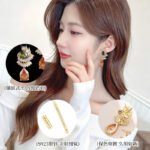 Teardrop CZ crystal drop earrings featuring fan-shaped baguette crystal halos, pear-cut focal stones, and hypoallergenic 925 sterling silver posts.