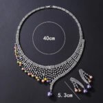 Wholesale Mesh Pearl Set featuring a CZ golden lattice collar with multicolored shell pearl drops on gold plated copper from JuneJewelry.com