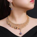 Wholesale Mesh Pearl Set featuring a CZ golden lattice collar with multicolored shell pearl drops on gold plated copper from JuneJewelry.com
