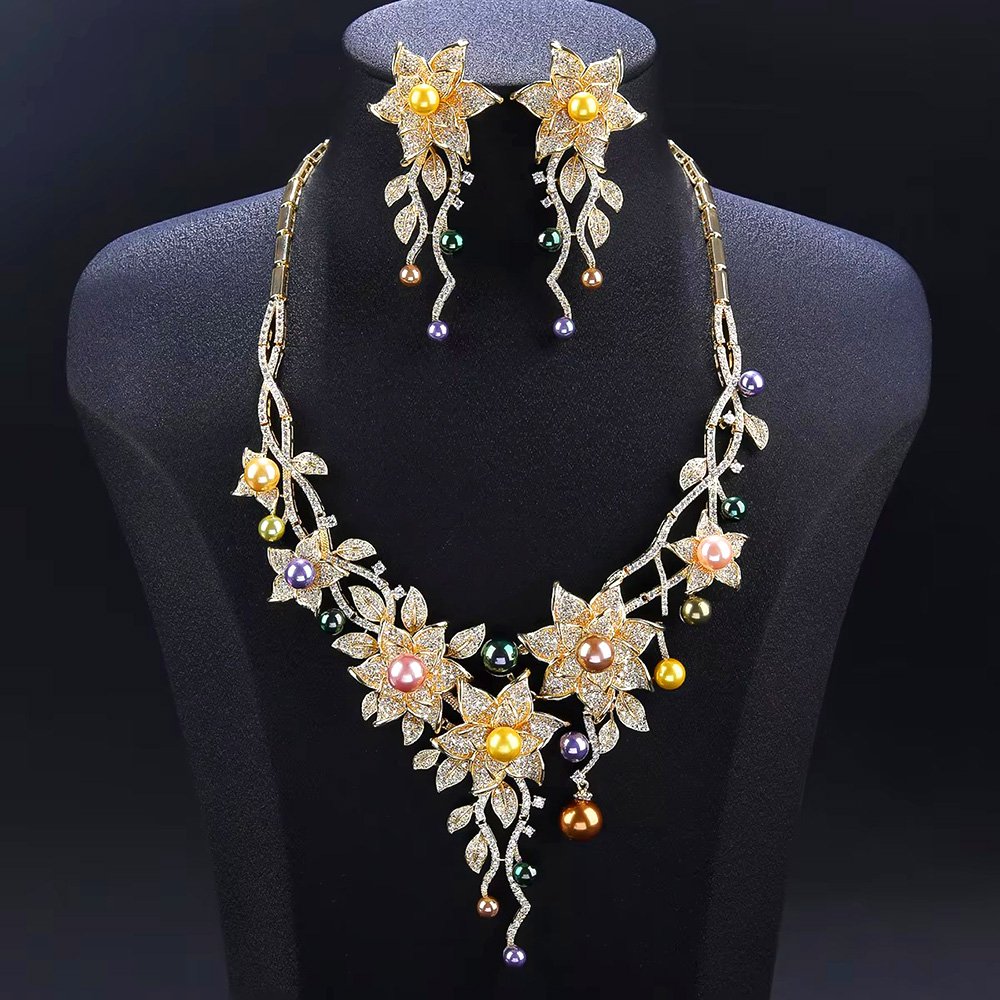 CN11471.909.A Wholesale Lily Pearl Set featuring CZ lily flowers and vine branch drops with multicolored shell pearls on gold plated copper from JuneJewelry.com – SKU CN11471.909.A.