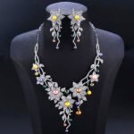 Wholesale Lily Pearl Set featuring CZ lily flowers and vine branch drops with multicolored shell pearls on gold plated copper from JuneJewelry.com – SKU CN11471.909.A.