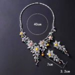 Wholesale Lily Pearl Set featuring CZ lily flowers and vine branch drops with multicolored shell pearls on gold plated copper from JuneJewelry.com – SKU CN11471.909.A.