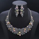 Wholesale Crown Pearl Set featuring a CZ diamond mesh collar with multicolored shell pearls on gold plated copper from JuneJewelry.com – SKU CN11546.795.A.