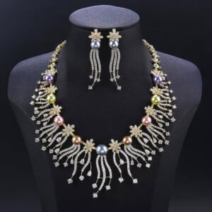 Wholesale Starburst Pearl Set featuring CZ starburst flowers and tassel strands with multicolored shell pearls on gold plated copper from JuneJewelry.com