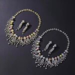 Wholesale Starburst Pearl Set featuring CZ starburst flowers and tassel strands with multicolored shell pearls on gold plated copper from JuneJewelry.com