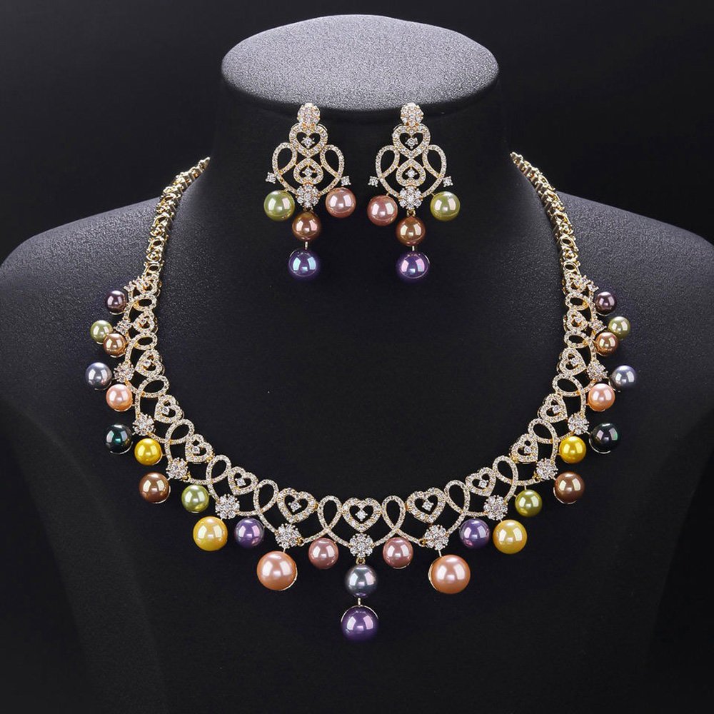 Wholesale Lace Pearl Set featuring CZ paved openwork heart loops with dangling colorful shell pearls on gold plated copper from JuneJewelry.com.