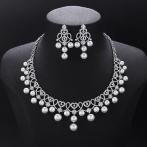 Wholesale Lace Pearl Set featuring CZ paved openwork heart loops with dangling colorful shell pearls on gold plated copper from JuneJewelry.com.