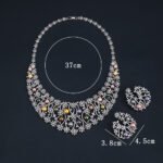 Wholesale Spiral Pearl Set featuring a CZ spiral vine collar with multicolored shell pearls on gold plated copper from JuneJewelry.com.