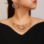 Wholesale Spiral Pearl Set featuring a CZ spiral vine collar with multicolored shell pearls on gold plated copper from JuneJewelry.com.