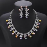 Wholesale Vine Pearl Set featuring CZ micro paved olive leaf branches with dangling colorful shell pearls on gold plated copper from JuneJewelry.com.