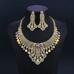 Wholesale Feather Pearl Set featuring a CZ leaf bib necklace with dangling colorful shell pearls on gold plated copper from JuneJewelry.com.